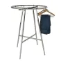 Round clothing rack displaying hanging apparel items.
