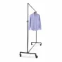Height-adjustable grey pipeline rack displaying a blue men's dress shirt to demonstrate vertical clearance.