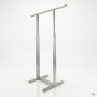 MDR09C Bauhaus single-bar garment rack showing the adjustable telescoping uprights and minimalist modern design for apparel merchandising