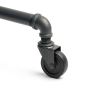 Close up of heavy-duty rubber caster on a pipeline style retail clothing rack.
