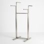 Bauhaus 4-way stainless steel display rack with rails set at staggered heights on a H-form base.