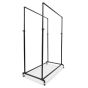 Adjustable black industrial pipe clothing rack on casters, side profile view - with optional casters