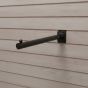 Heavy-duty Industrial Pipeline Slatwall Faceout hangrail mounted on a light wood slatwall panel.