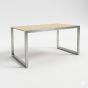 Large Alta Display Table with 60-inch maple melamine top and brushed steel frame. 