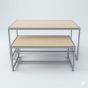 Retail nesting display table set with steel frames and light maple wood laminate tops, viewed from the front