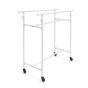 White industrial pipe double clothes rack with adjustable rails for boutique apparel display.