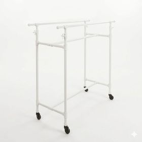 White industrial pipe double clothes rack with adjustable rails for boutique apparel display.