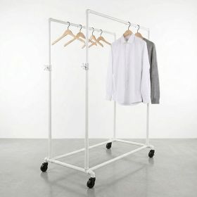 Boutique showroom display featuring white industrial pipe garment rack with double hang rails