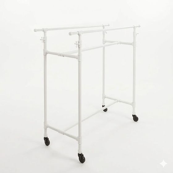 White industrial pipe double clothes rack with adjustable rails for boutique apparel display.